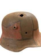 Camouflage German M16/M17 Stahlhelm WW1 with bullet impact