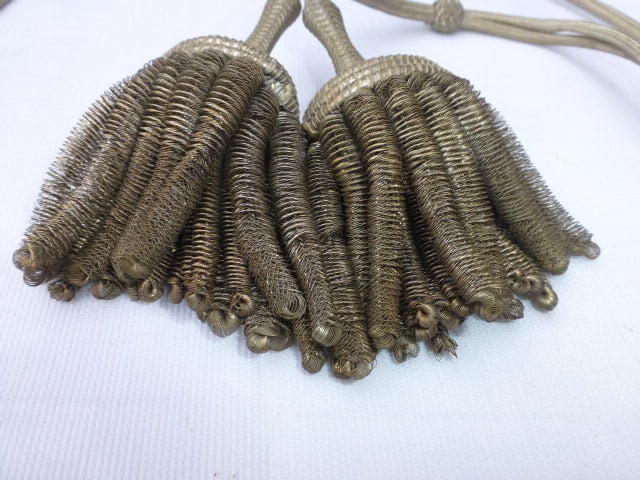 Vangsnoer met 2 zilver kleurige kwasten