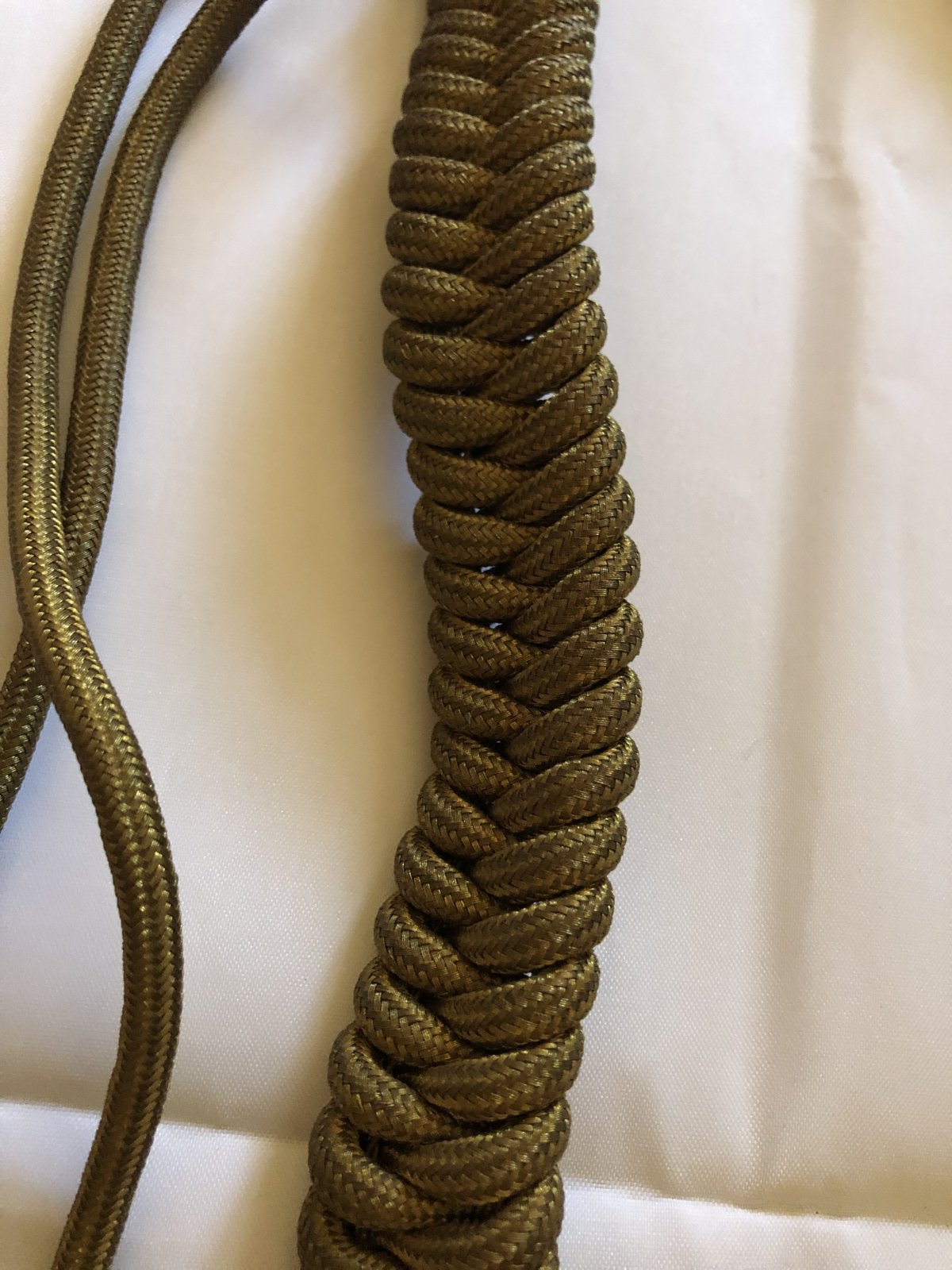 Goud kleurige Fouragere  omstreeks 1900