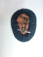 Pet embleem Douane Nederland