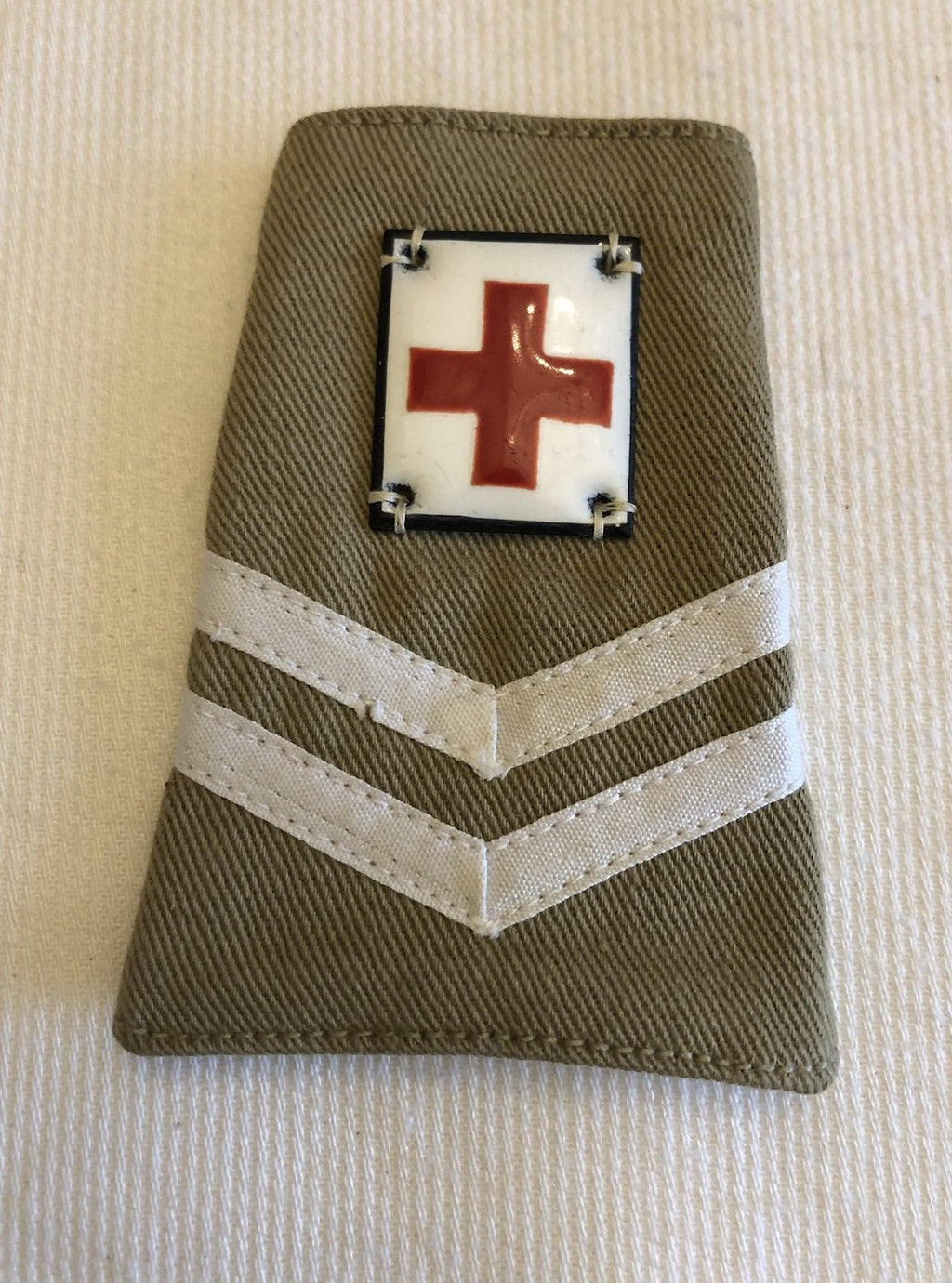 1 Schuifpassant KL in Ned -Indie Gewonden verzorger