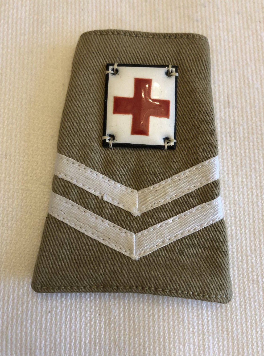 1 Schuifpassant KL in Ned -Indie Gewonden verzorger