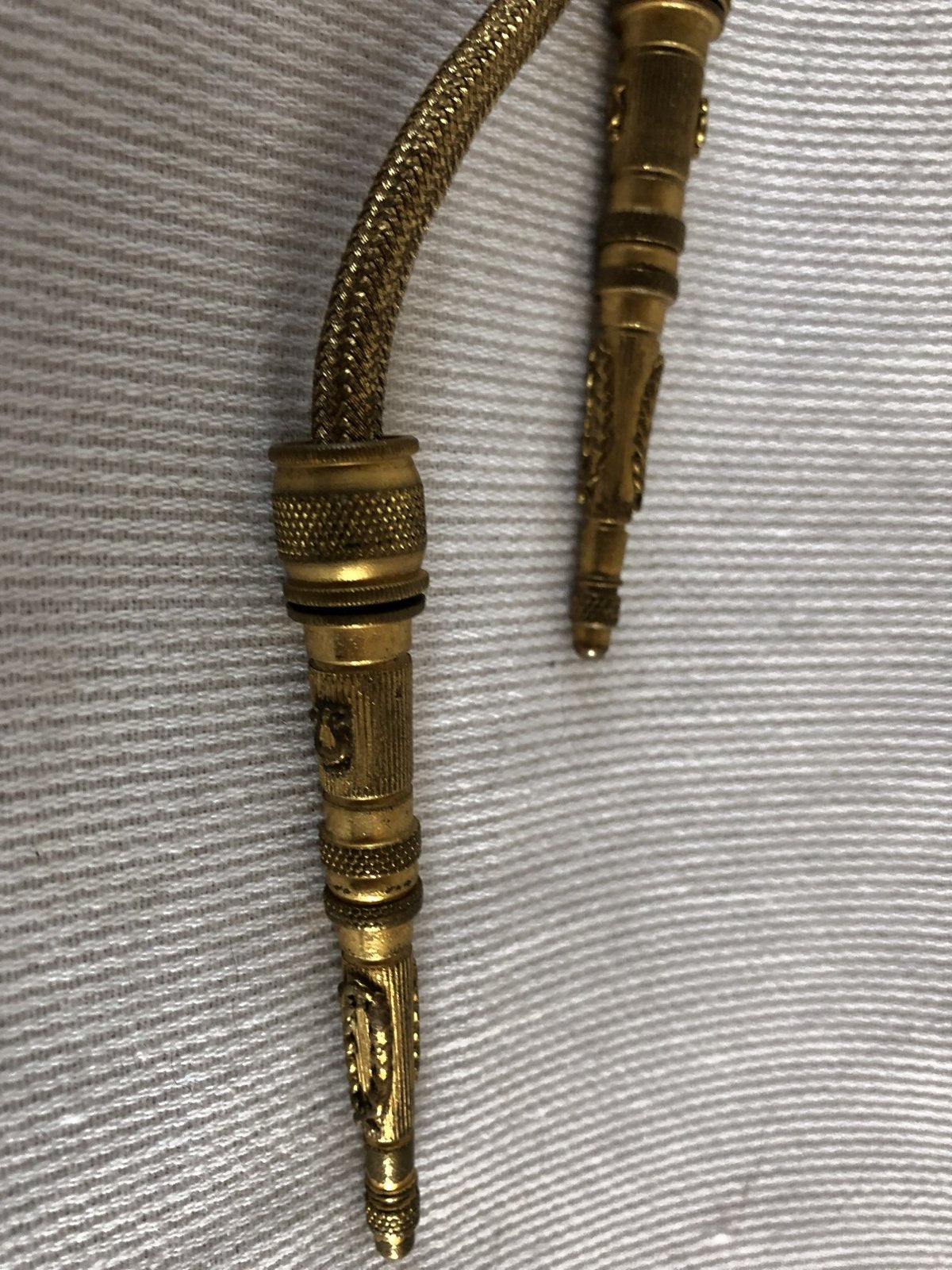 Goudkleurige fouragere met epauletten