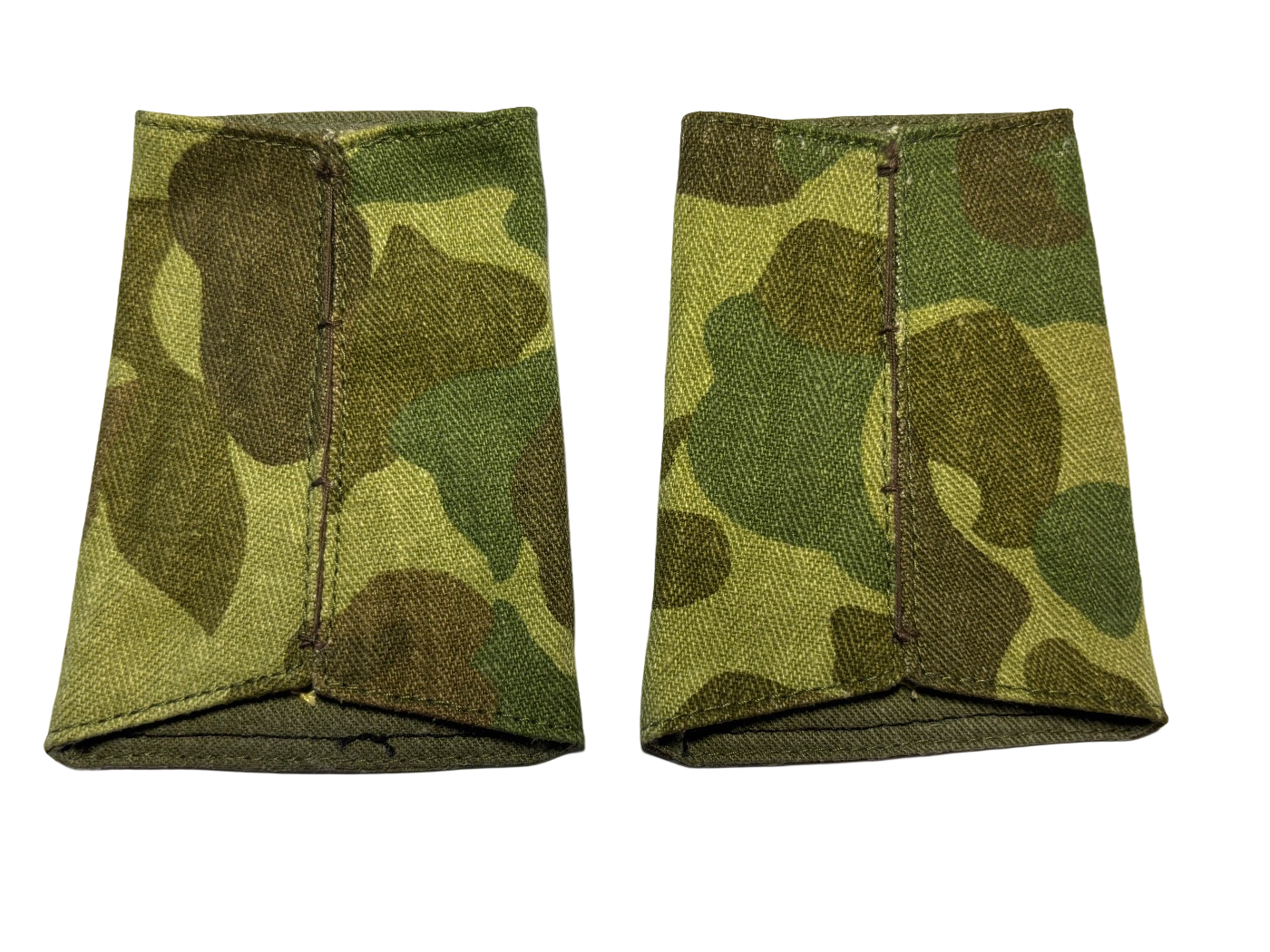 1 paar schuifpassanten Speciale Troepen Korporaal