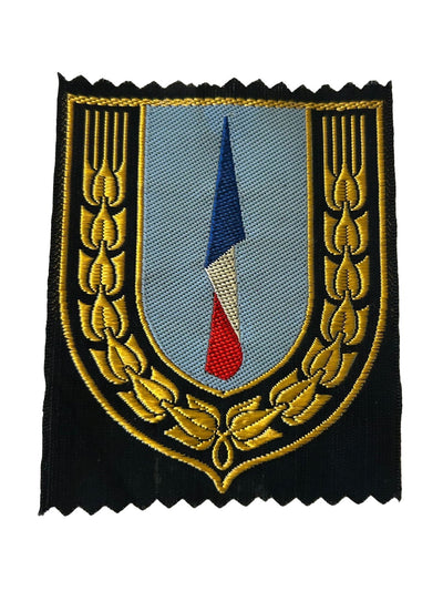 Stoffen insigne van de algemene “blauwe sector” of industriële sector van de Chantiers de Jeunesse (CJF), regering van Vichy, 1940–1944